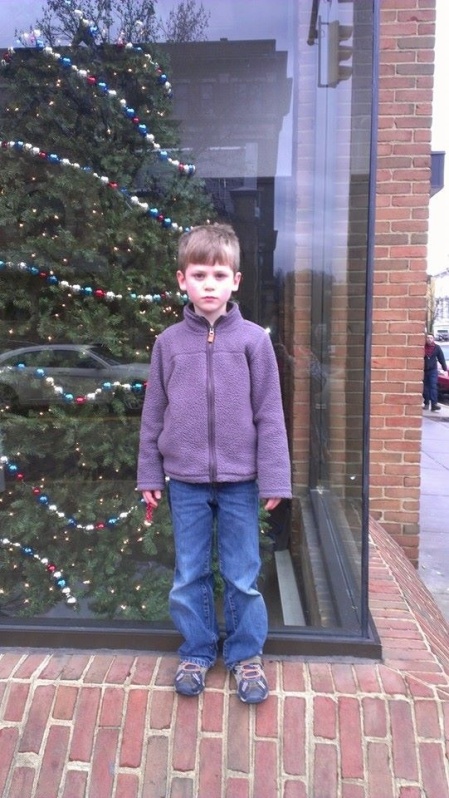 Noah, being serious about Christmas decorations in town.